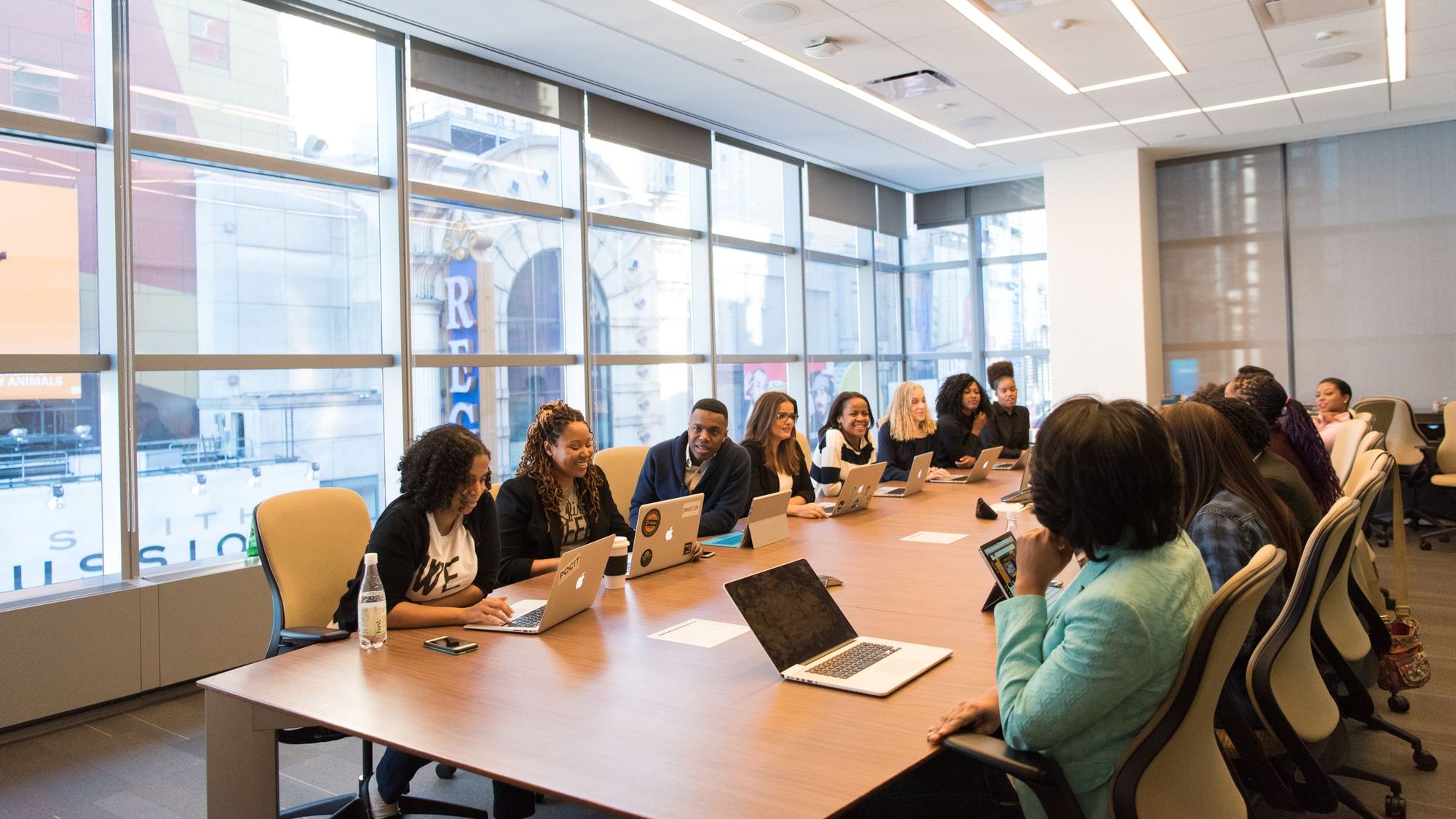 Team meeting around a long conference table