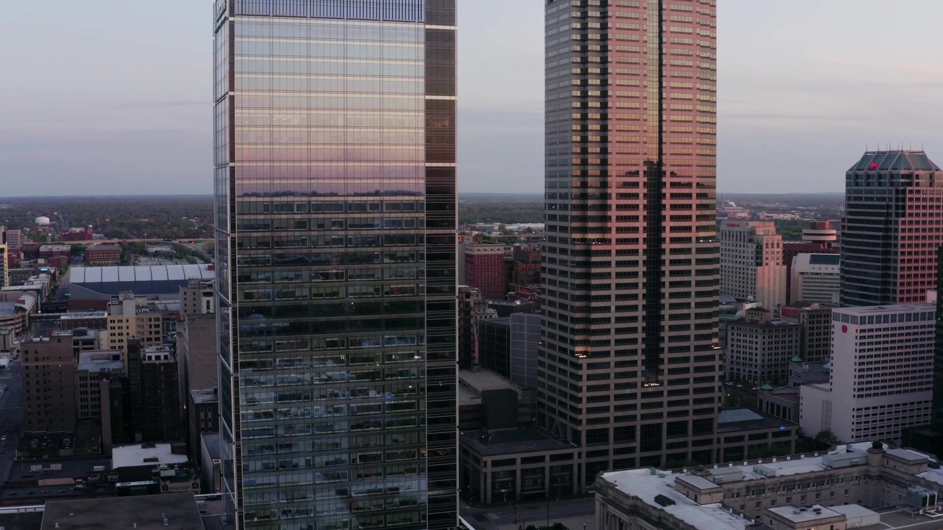 Glass office towers above a city